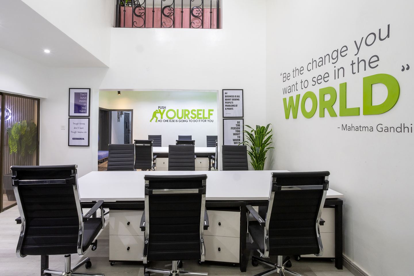 Novac collaborative workspace with motivational wall graphics